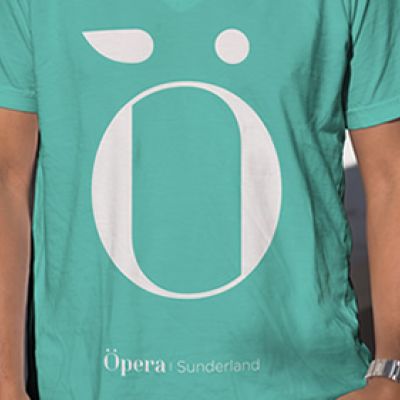 Opera Sunderland logo printed on a green t-shirt